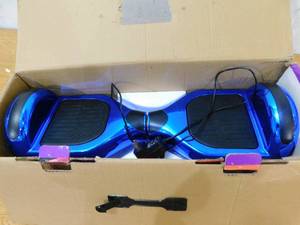 lot 106 image: GlareWheel Bluetooth Light-Up Wheels Hoverboard