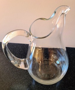 lot 76 image: Pair of Glass Serving Pitchers