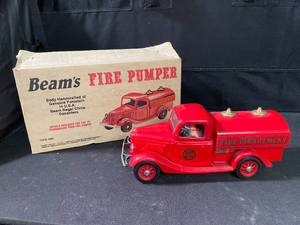 lot 53 image: Jim Beam Fire Pumper decanter with decals and original box