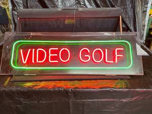 lot 38 image: Video Golf neon sign with protective plexi cover