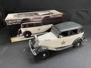 lot 52 image: Jim Beam police patrol car decanter with decals and original box