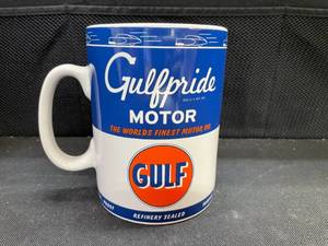 lot 146 image: Gulf Oil  Gulf Pride Motor Oil, quart size coffee mug