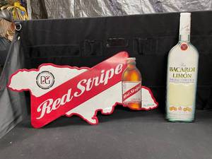 lot 215 image: Red Stripe and Bacardi Rum tin tackers, Lot of 2