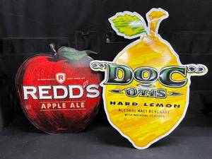 lot 244 image: Reds Apple Ale and Docs Hard Lemonade tin tackers