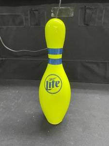 lot 165 image: Miller Lite bowling pin, fluorescent yellow
