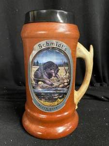 lot 288 image: Schmidts stag handled mug with snowglobe effect. Black Bear 1995.