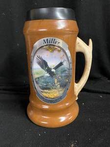 lot 289 image: Miller stag handled mug with snowglobe effect. Eagle. 3rd in the series..