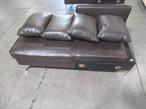 lot 104 image: Chaise Part of Sofa - Missing 1 Backrest, includes 4 pillows - For parts.