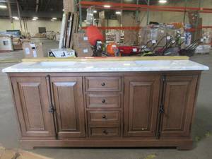 lot 119 image: Home Decorators Collection Clinton 72 in. W Double Vanity in Antique Coffee with Natural Marble Vanity Top in White with White Basins, 9785100800. LH Side Doors are cracked. Vanity Top Scratched not cracked.