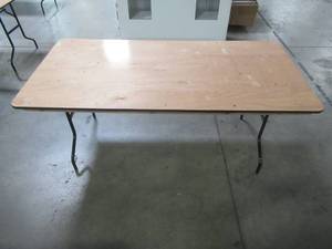 lot 92 image: Table With Folding Legs, Approximate Dimensions 72 x 35 12 x 30 12 Tall. - Top is Scratched.