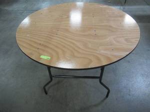 lot 96 image: Table With Folding Legs, Approximate Dimensions 48 Dia. x 30 12 Tall. - Top is Scratched.