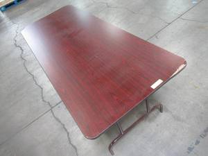 lot 99 image: Table With Folding Legs, Approximate Dimensions 48 Dia. x 30 12 Tall. - Top is Scratched has Corner Damage.