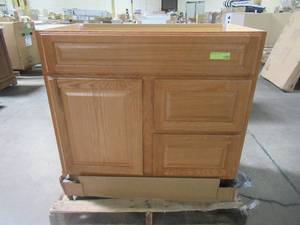 lot 210 image: Glacier Bay Hampton 36 in. W x 21 in. D x 33.5 in. H Vanity Cabinet Only in Oak, HOA36D - Scratch & Dent - Missing Pulls.