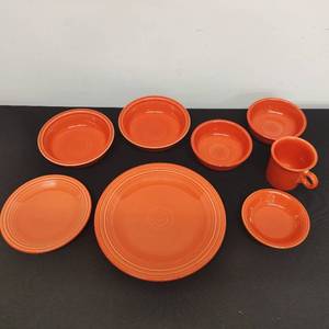 lot 22 image: Set of 8 Fiesta Ware, potentially Persimmon tone