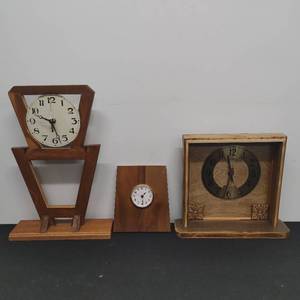 lot 89 image: Three Clocks
