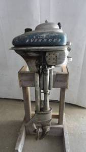lot 38 image: Vintage Evinrude Zephyr out board motor