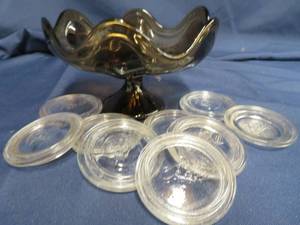 lot 78 image: 9 VINTAGE GLASS BALL LIDS IN A PRETTY BROWN DISH