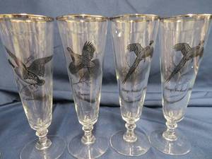 lot 80 image: 1960S PLATINUM RIMMED PILSNER GAME BIRD GLASSES PLUS MORE.