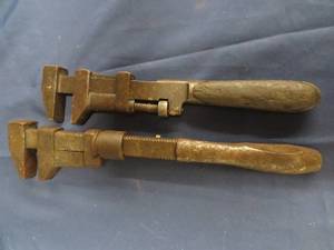lot 105 image: VINTAGE PIPE WRENCHES.