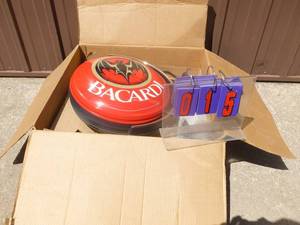 lot 15 image: Bacardi rotating pub sign. I opened box for the 1st time to take pictures. Dated 42007. Absolutely new & unused. As shown.