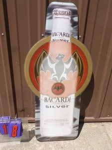 lot 18 image: Bacardi silver tin sign. 36 x 17. Looks to be unused. As shown.