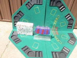 lot 21 image: Casino brand folding poker table top with cards, chips & carrying case. Could use a good cleaning. Otherwise in good shape. As shown.