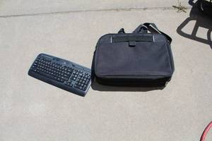 lot 613 image: Logitech Wireless Computer Keyboard K330  with Solo Computer Laptop Carry Case