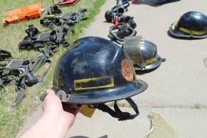 lot 682 image: Kevlar Fire Helmet Black with logo Baldwin TWP N.E. Sherburne  with Clear Face Shield and Neck Flap
