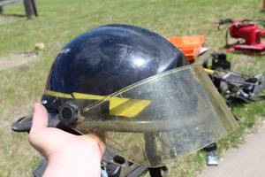 lot 685 image: Kevlar Fire Helmet Black with logo Baldwin TWP N.E. Sherburne  with Clear Face Shield and Neck Flap