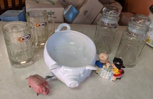 lot 23 image: Kitchen Decor A&W Mugs, Porky Pig Shaker Set, etc.