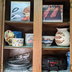 lot 29 image: Contents of Kitchen Cupboard Glass Baking Dishes, Sandwich Maker, Defrosting Tray, etc.