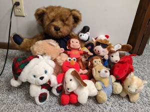 lot 51 image: Lot of Stuffed Animals Curious George, Clifford, Elmo, etc.