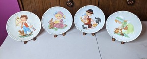lot 239 image: (4) Vintage Cobblestone Kids Plates