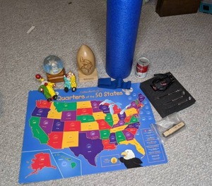 lot 369 image: Really Random Lot Exercise Gear, Clowns, MN Vikings, State Quarters Display, etc.