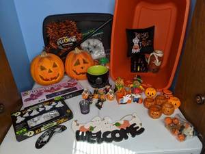 lot 377 image: Lot of Halloween Decor with Storage Bin