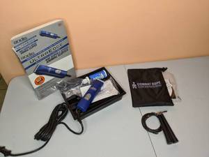 lot 128 image: New Combat Jump Rope and New Andis Animal Clipper