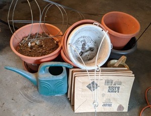 lot 438 image: Lawn & Garden Tomato Cages, Planters, Watering Can, Leaf Bags