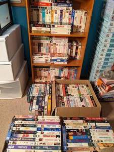 lot 174 image: Large Lot of Vintage VHS Tapes and Bookshelf