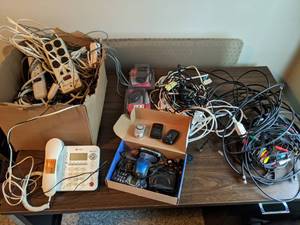 lot 92 image: Flip Phones, Power Strips, Cords, etc.
