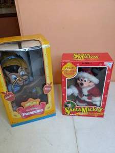 lot 307 image: Disney Toys Pinocchio Animated Marionette & Poseable Santa Mickey Mouse in Original Boxes