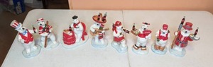 lot 286 image: (8) Coca-Cola Around the World Collectible Polar Bear Figurines