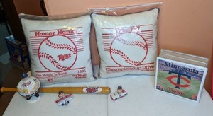 lot 294 image: Twins Memorabilia Homer Hanky Pillows, Mini Bat, Ball Holder, Lamp, Figurines
