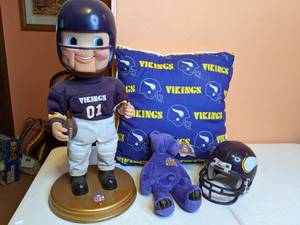 lot 295 image: Vikings Memorabilia Dancing Statue, Teddy Bear, Mini Helmet, Throw Pillow