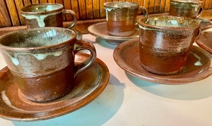 lot 65 image: 6 Pottery Cups with Saucers