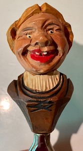 lot 97 image: Hat Raising Figurine Bottle Stopper and a Carved Bottle Opener