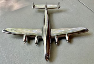 lot 305 image: Airplane Hood Ornament
