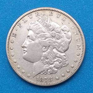 lot 3 image: 1878 Morgan Silver Dollar, 3rd Reverse--7 Tail Feathers