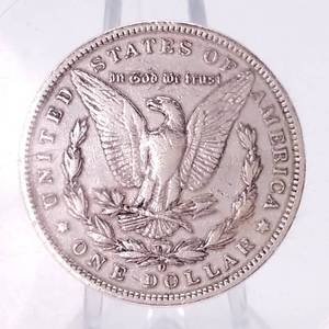 lot 29B image: 1899 O Morgan Silver Dollar in a Lucite Puck