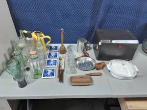 lot 37 image: Vintage Kitchen Ware, Bread Box, Butter Dish, Hot Plates, Bottles, Trivets,  Glass Rolling Pin, More