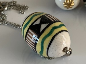 lot 263 image: Pysanky Themed Jewelry Items